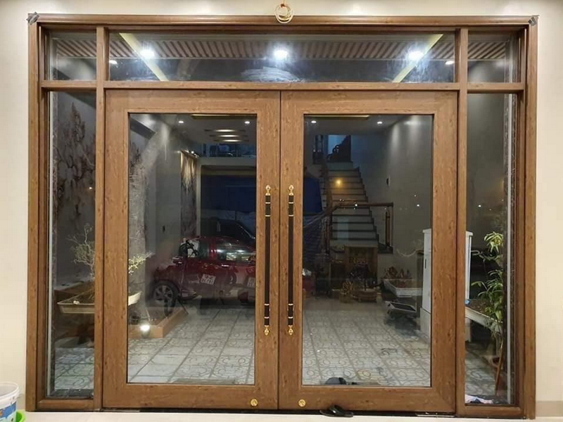Cửa nhôm thủy lực màu gỗ hương